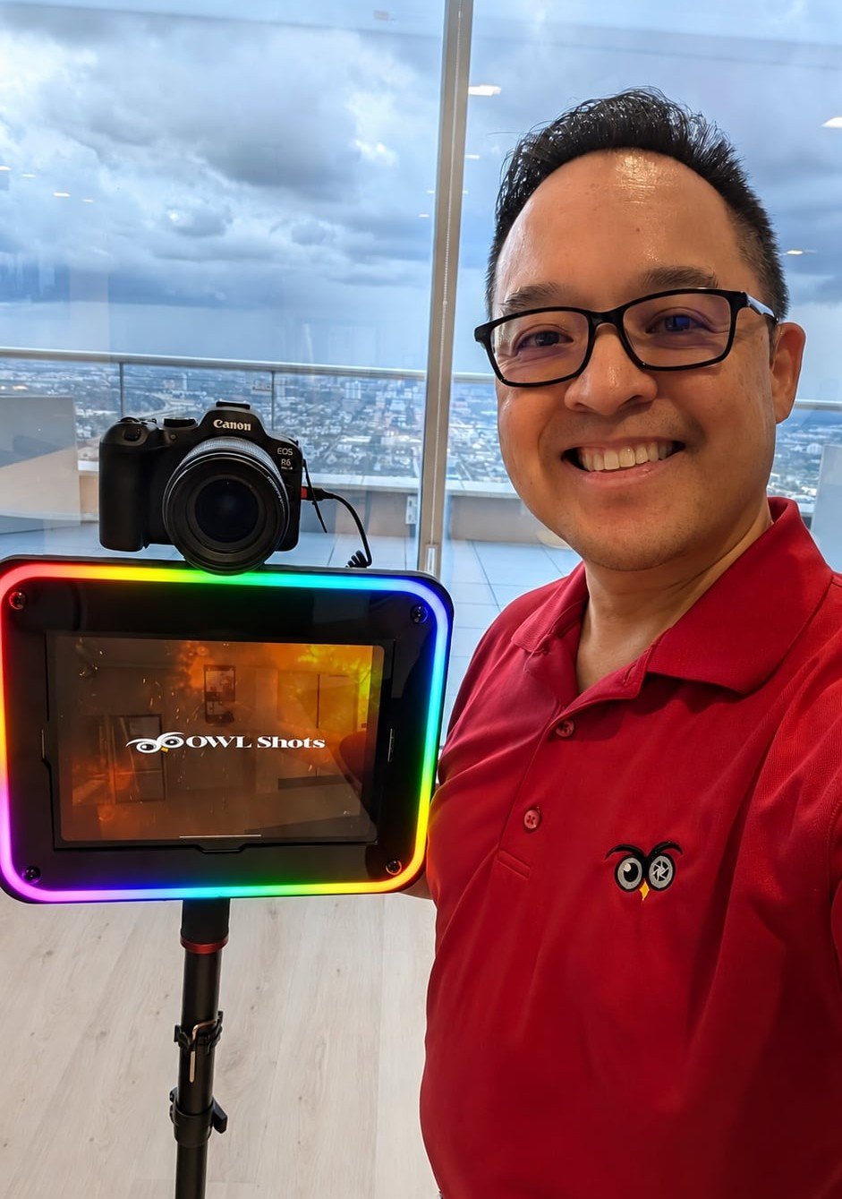 An OWLShots team member with our roaming photographer camera and tablet rig